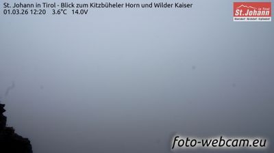 Gemeinde Kirchdorf in Tirol: St. Johann in Tirol - Blick zum Kitzbüheler Horn und Wilder Kaiser