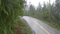 Ucluelet - Ucluelet › Západ: Highway 4 by Kennedy Lake, looking west