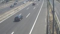 Budaors: Az autopalya es a vasut menti kereskedelmi-gazdasagi teruletek: M1 - M7 Budaörsi pihenő -> Budapest - Day time